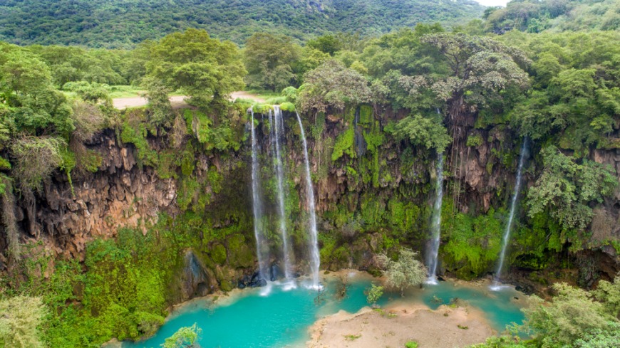 Ayn Athum waterfall in Jabal Qara, Salalah Oman